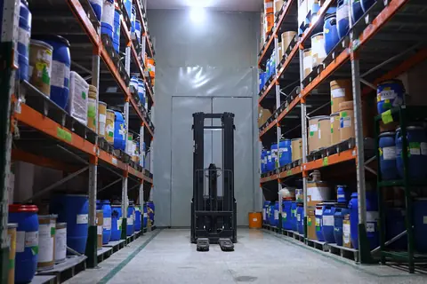 Aisles of a pharmaceutical warehouse, stock on racking